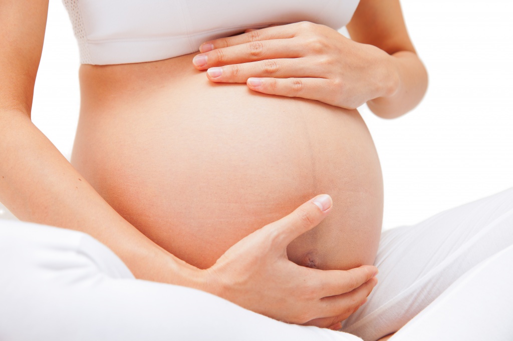 растяжки при беременности, причины, фото